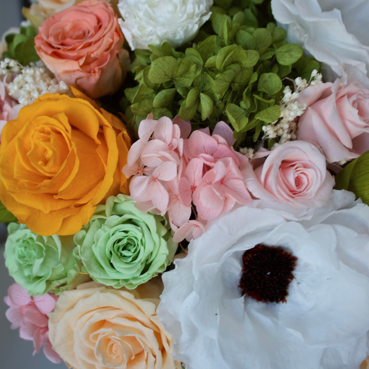 The Encanto by Eos Blooms: a luxury mix of preserved roses, hydrangeas, and anemones.