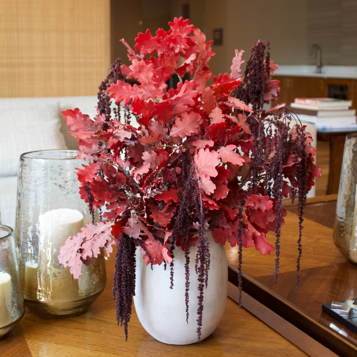 The Castaña by Eos Blooms: preserved oak leaves in a vase—timeless, elegant decor.