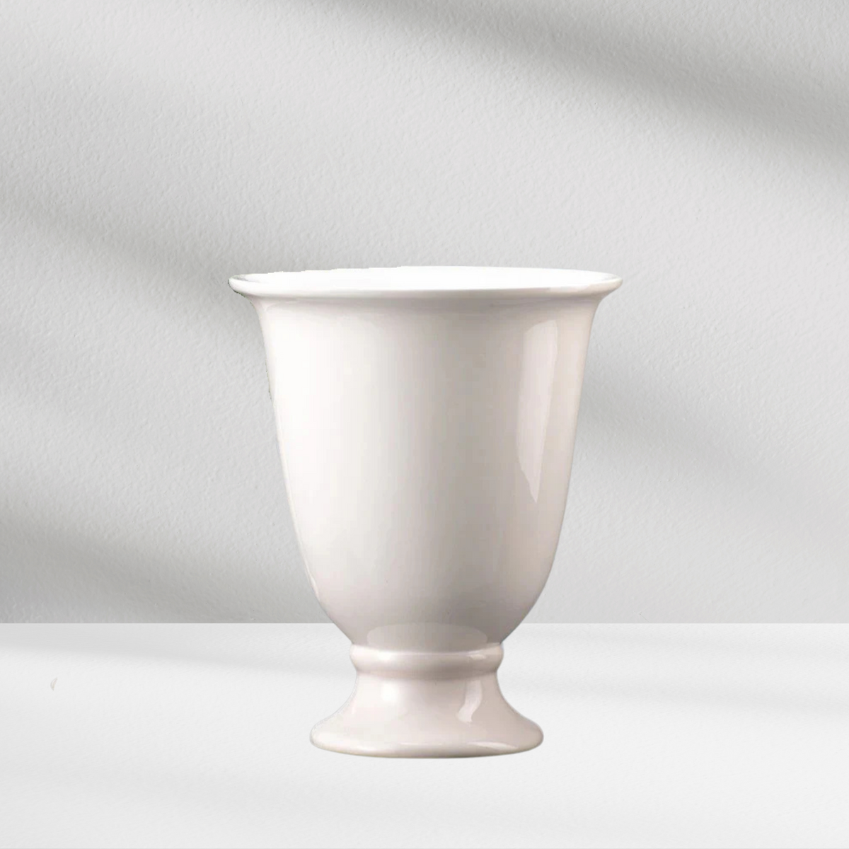 The Granada Vase by Eos Blooms features a wide rim and sleek porcelain design.