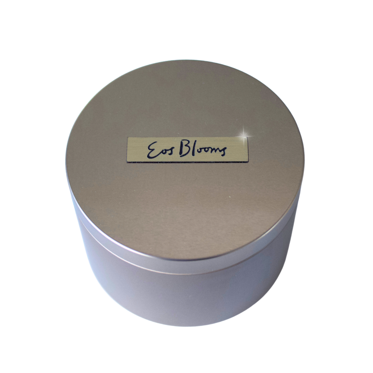 Gold-labeled Signature Luxe tin by Eos Blooms, featuring a preserved rose inside.