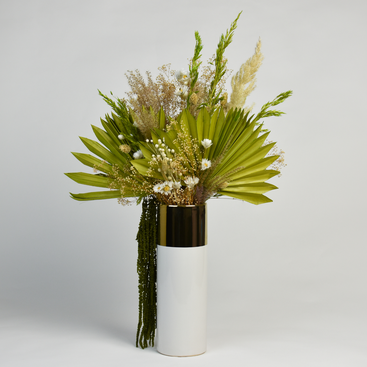 Thrive - Premium by Eos Blooms: tall white vase with palm leaves, dried & preserved flowers.