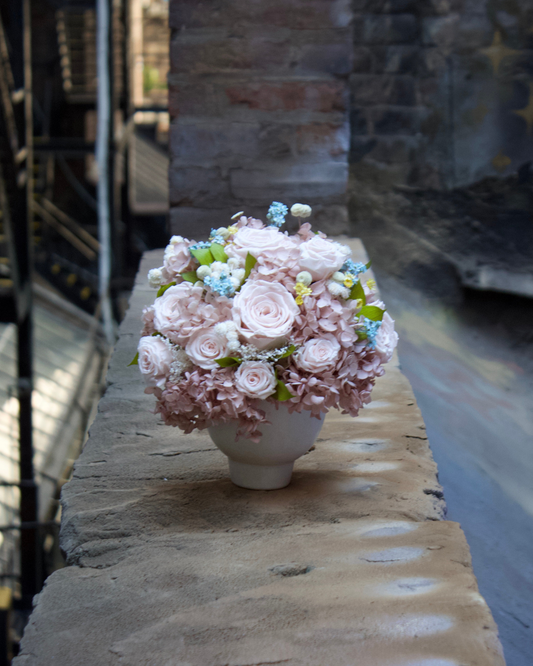 The Ballet Slipper (Petite) by Eos Blooms offers blush roses and whites—perfect for city elegance.