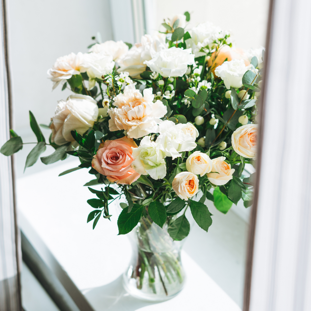 Fresh Flower Subscription by Eos Blooms, perfect for seasonal flower delivery in a glass vase.
