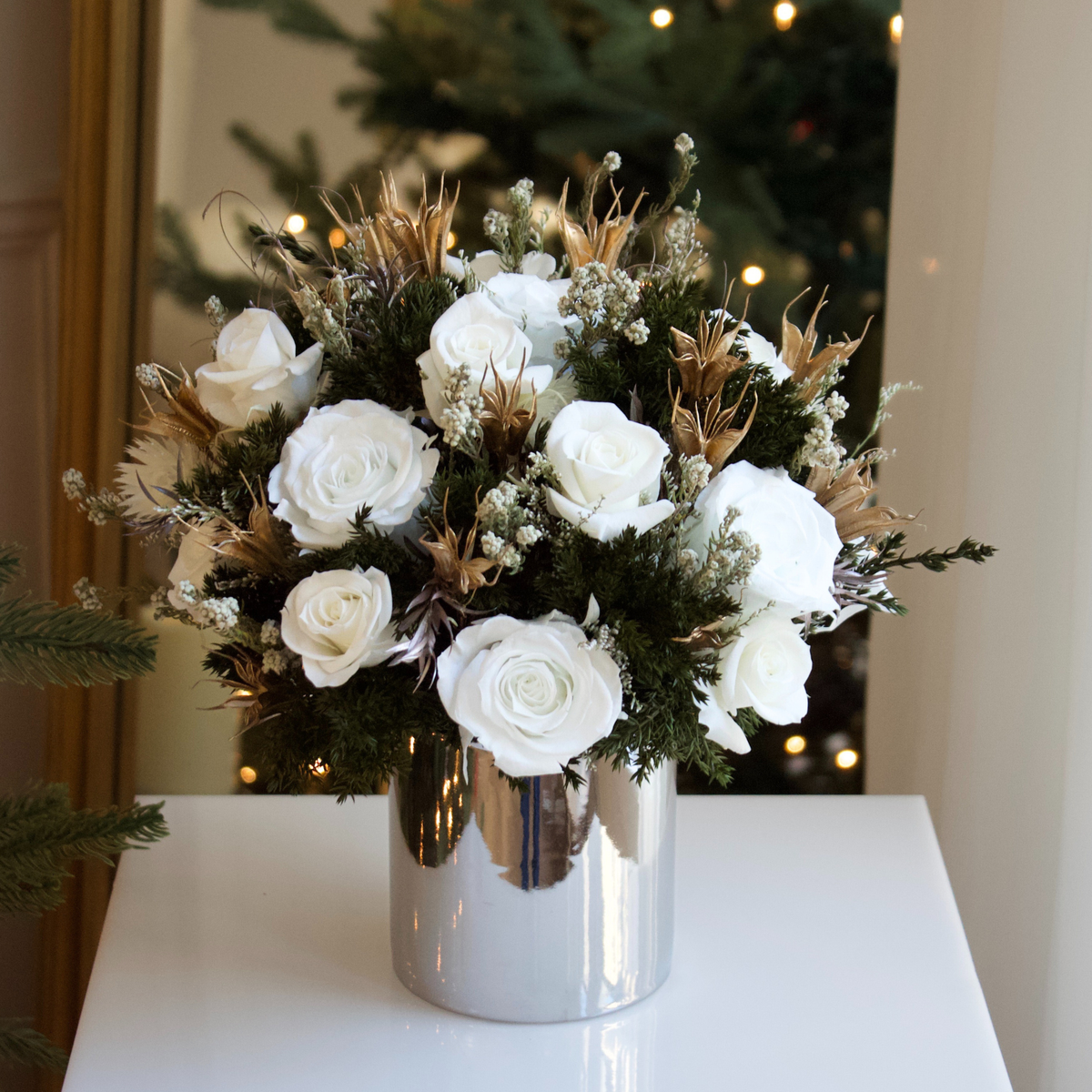 The Frost (Petite) by Eos Blooms: preserved roses in a silver vase for elegant holiday decor.