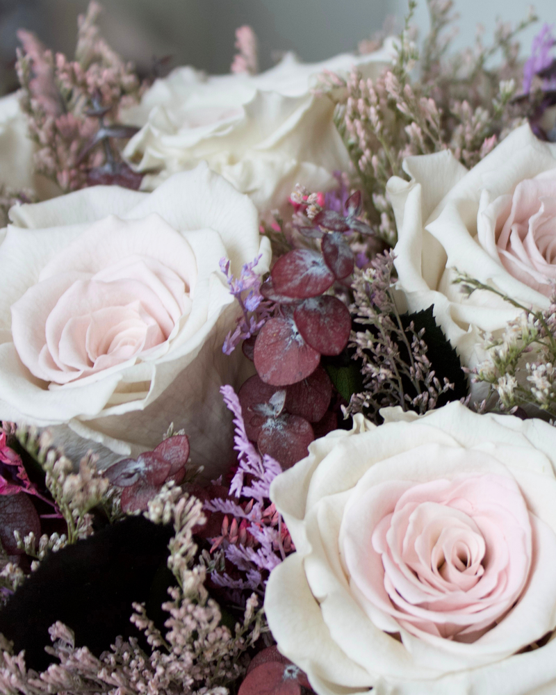 The Chantilly by Eos Blooms: romantic bouquet with pale pink roses and soft purple greenery.