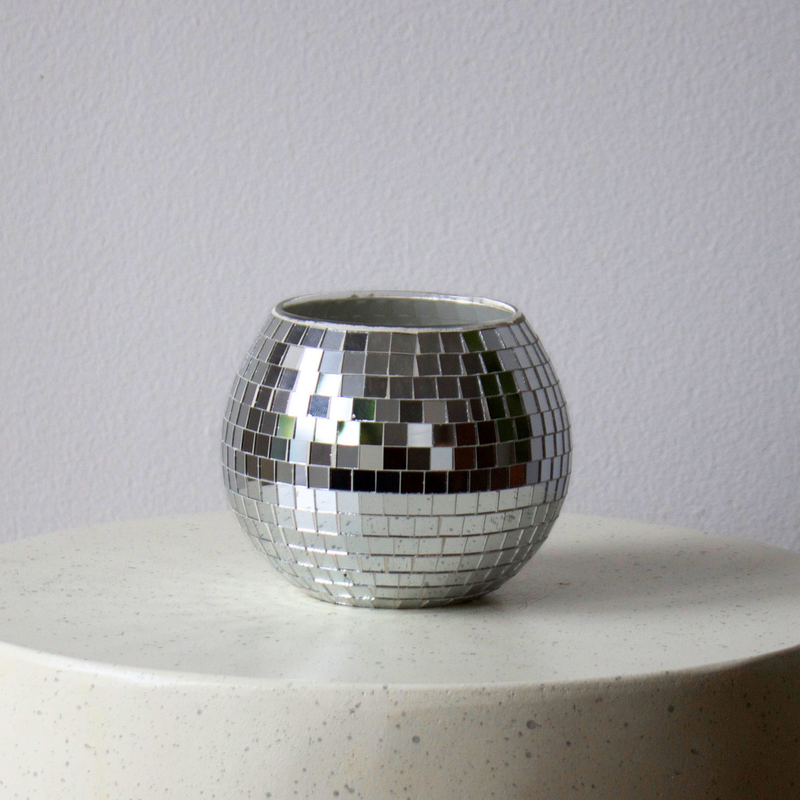 Eos Blooms Disco Ball Vase with square tiles on a light surface.