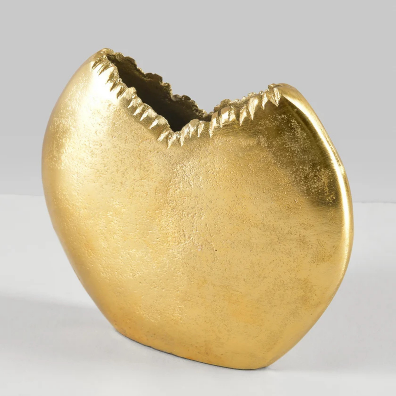 Eos Blooms Gold Cookie Vase has a jagged top and shines against a simple background.