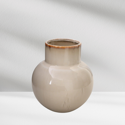 The Eos Blooms Rio Vase features glossy cream ceramic with a narrow neck and brown rim.