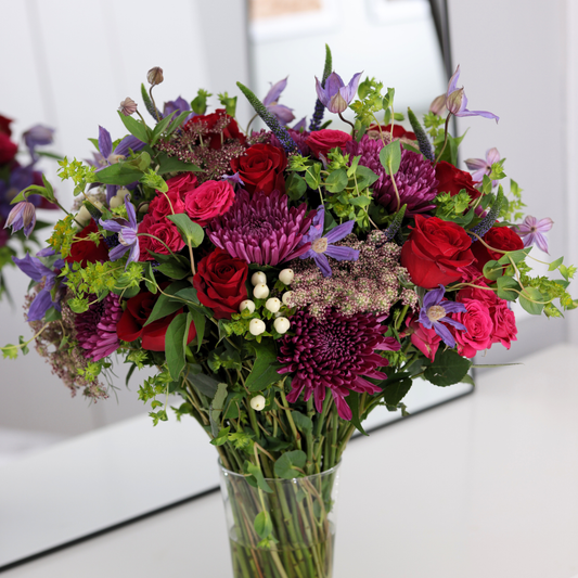 The Cosmos | Hotel Guest by Eos Blooms: a luxury plum and ruby-red flower arrangement.