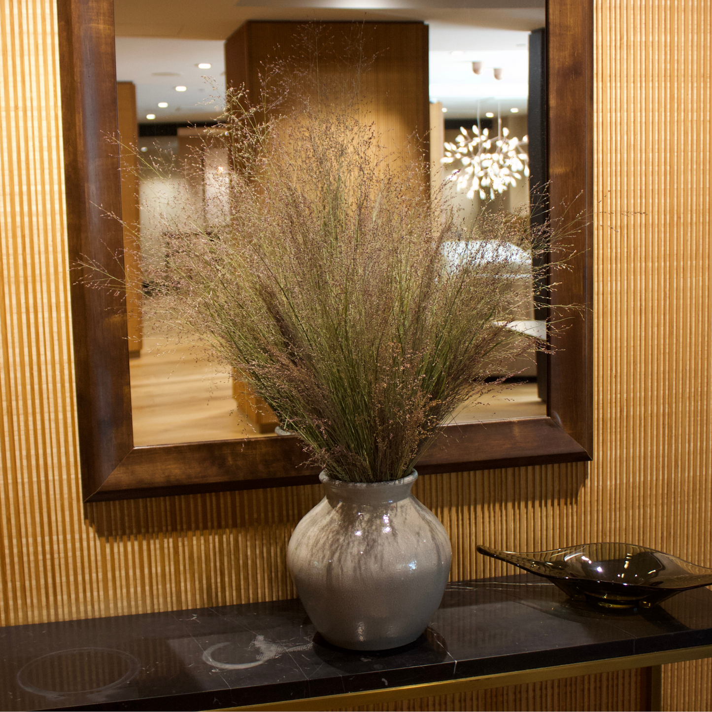 The Drifter by Eos Blooms adds zero-maintenance preserved switchgrass to your table décor.