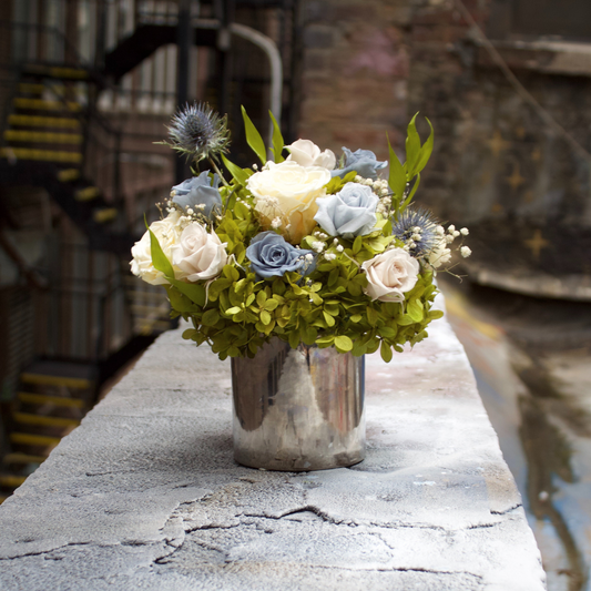 The Nantucket (Petite) by Eos Blooms: silver vase with preserved roses and greenery.